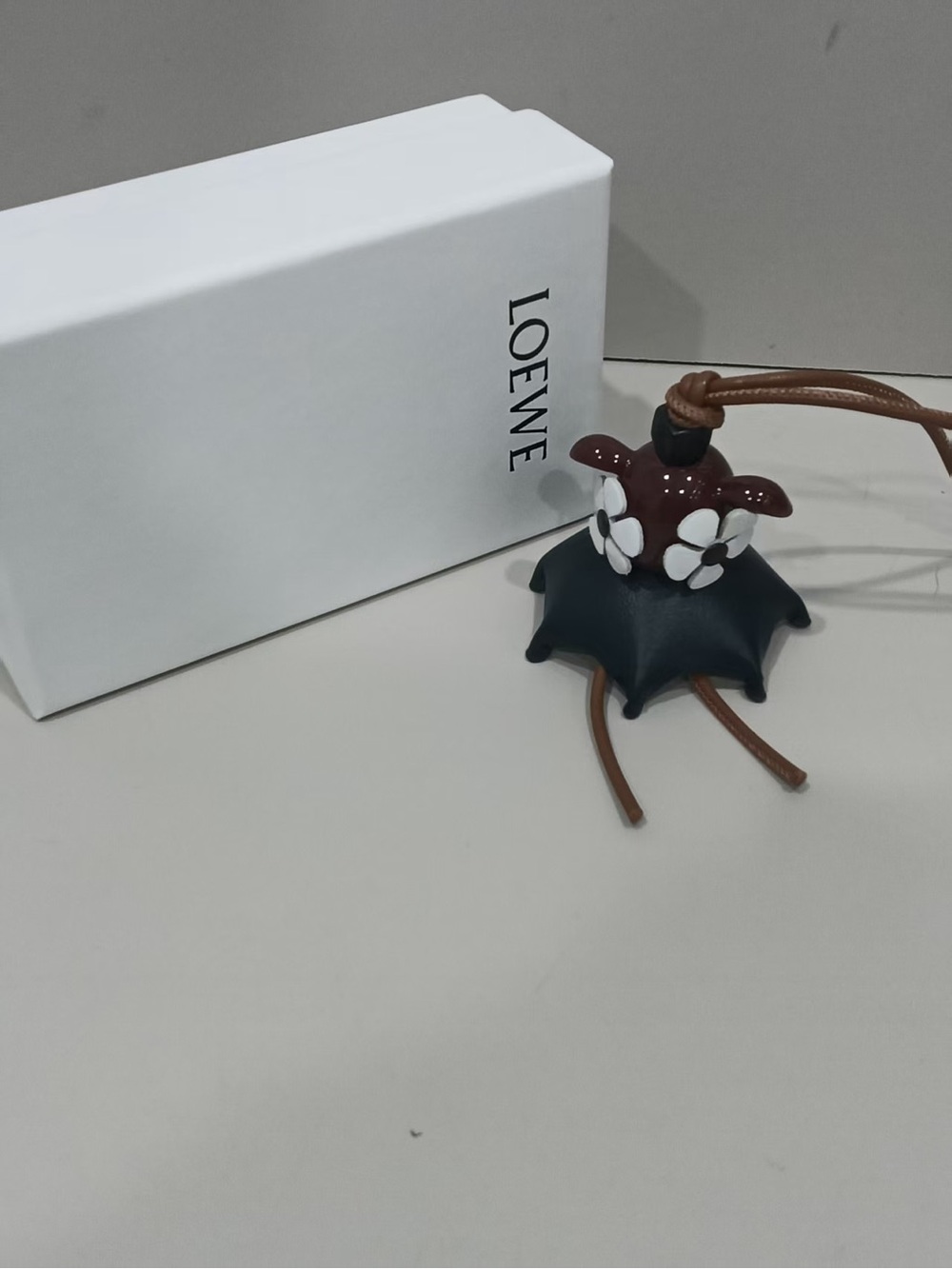 Loewe Black & Brown Floral Puzzle Charm with White Accents